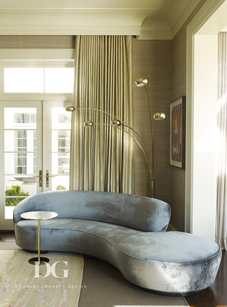 Rounded sofa and lamp